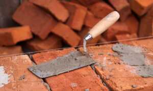 Возведение кирпичной стены: технология укладки
